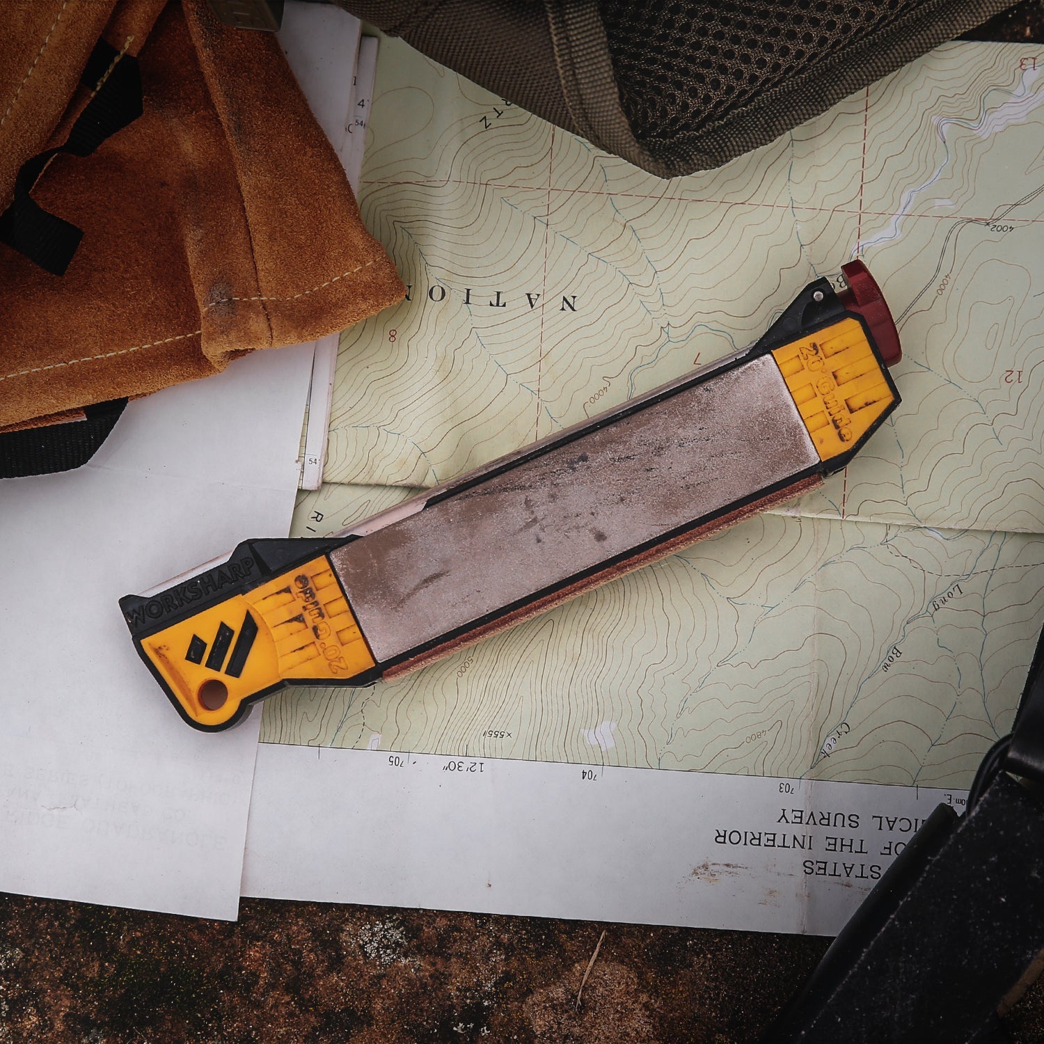 Worksharp Guided Field Sharpener being used outdoors in the field